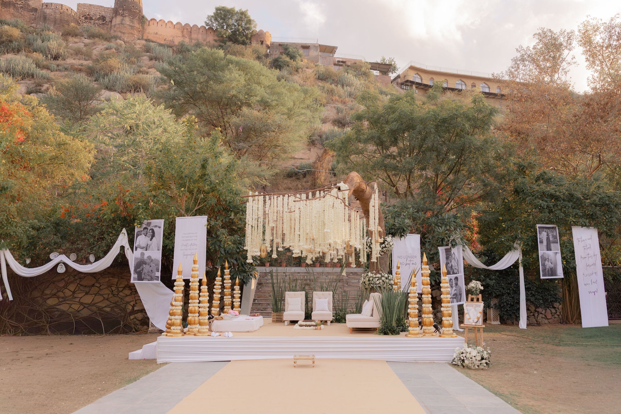 White floral mandap set on the lawn — Anupama & Abhinav, Mundota Palace, Jaipur