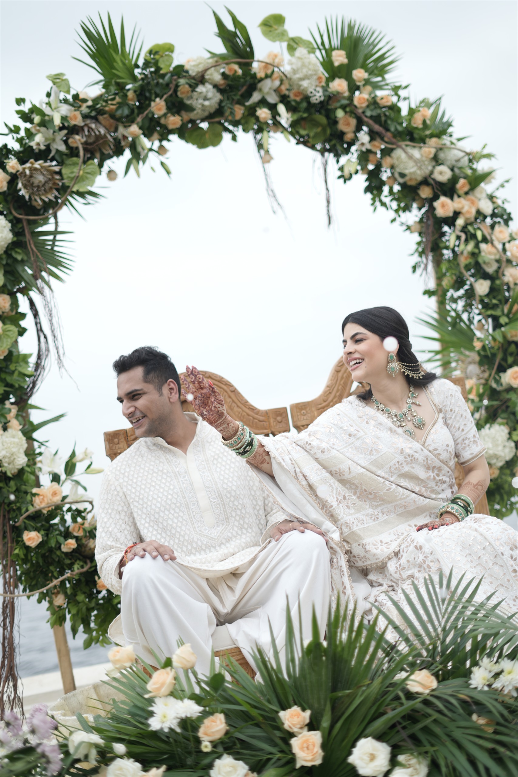 The couple during the haldi — The Leela Palace, Udaipur
